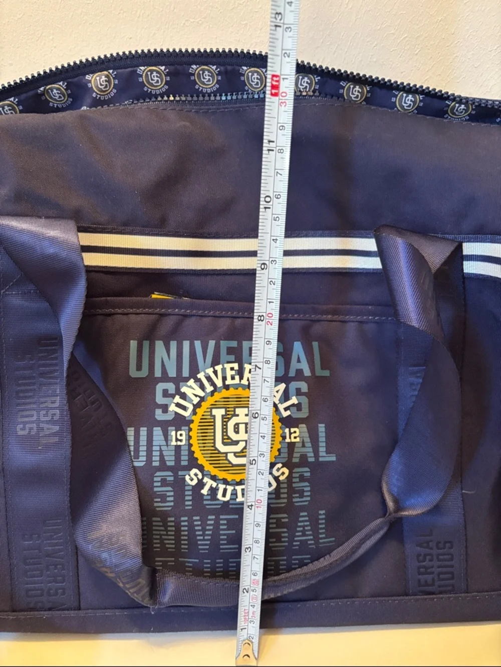 Limited 1912 Universal Studios Navy Duffel Bag with Yellow Logo Accent
